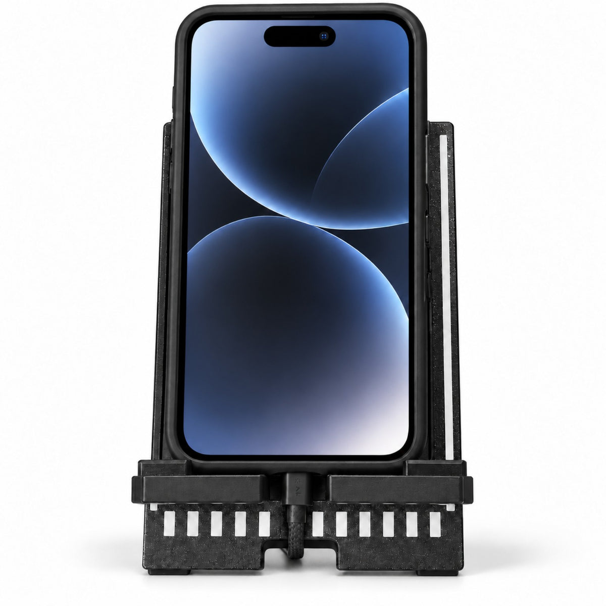Phone charging while resting in runway themed phone stand