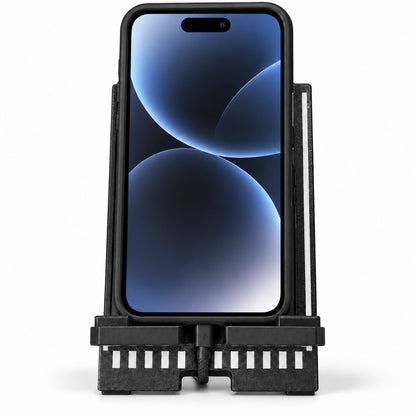 Phone charging while resting in runway themed phone stand